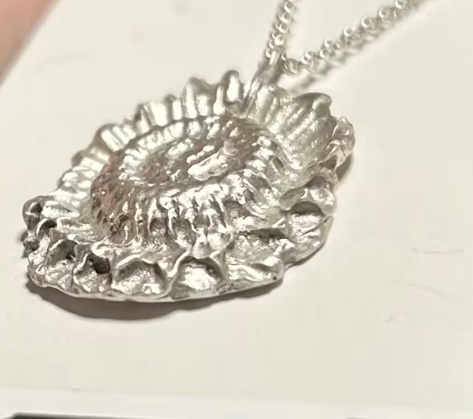 Handmade solid fine silver flower pendant on an 18 inch necklace