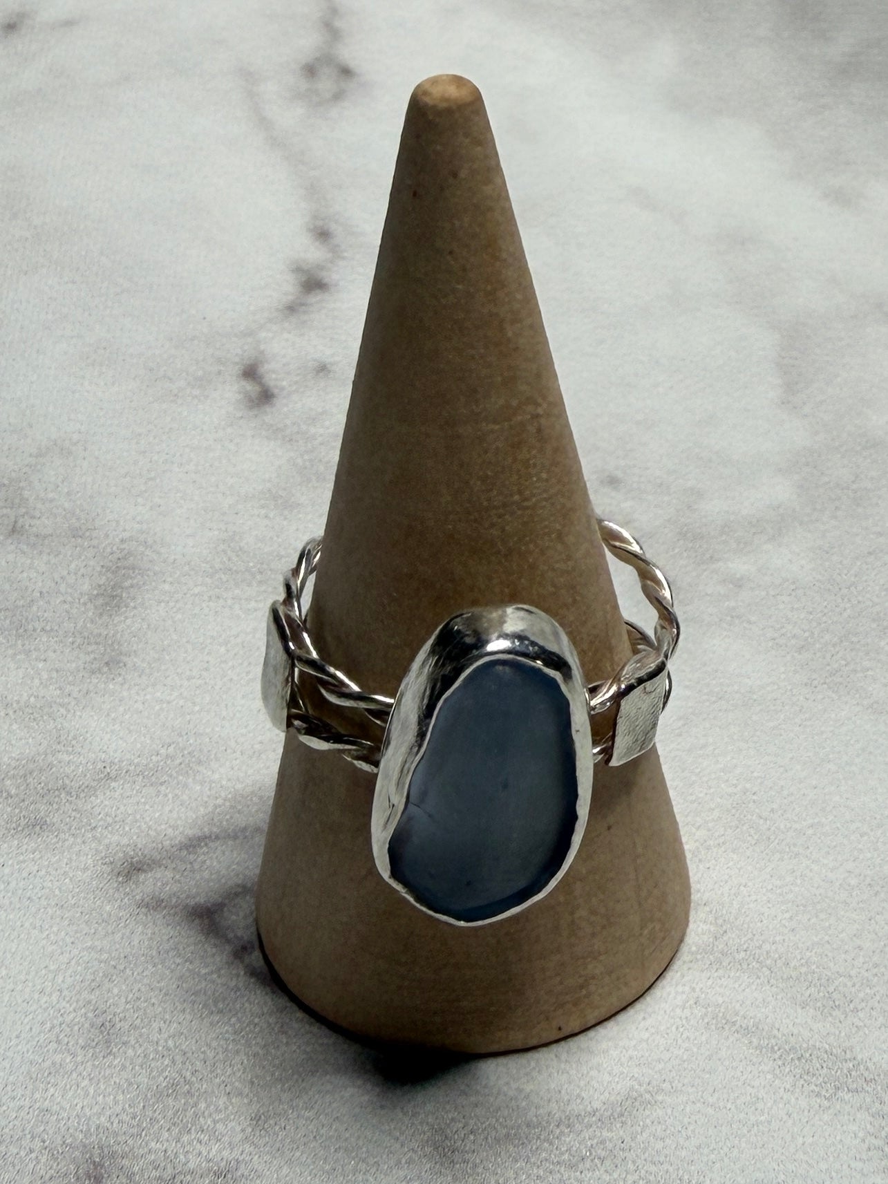 Handmade sterling silver double twist band with blue sea glass. Size Q