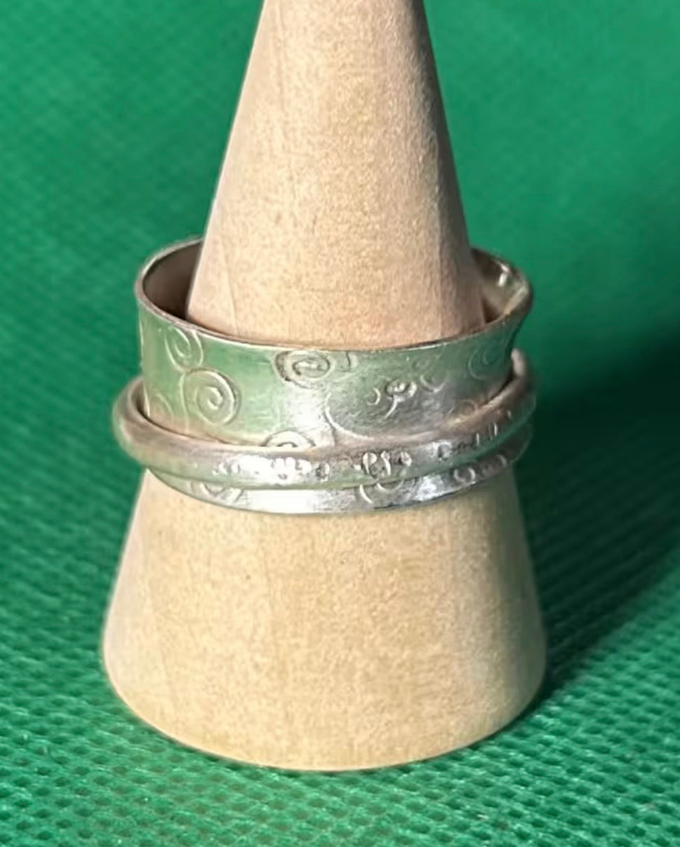 Hand made silver spinner anti anxiety fidget ring. Triskele spiral design