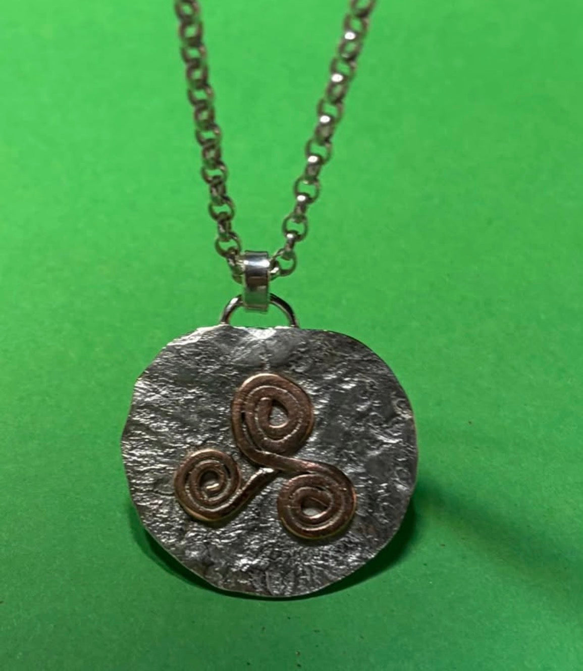 Handmade Sterling Silver pendant with copper Triskele. Choice of 18 or 20 inch chain