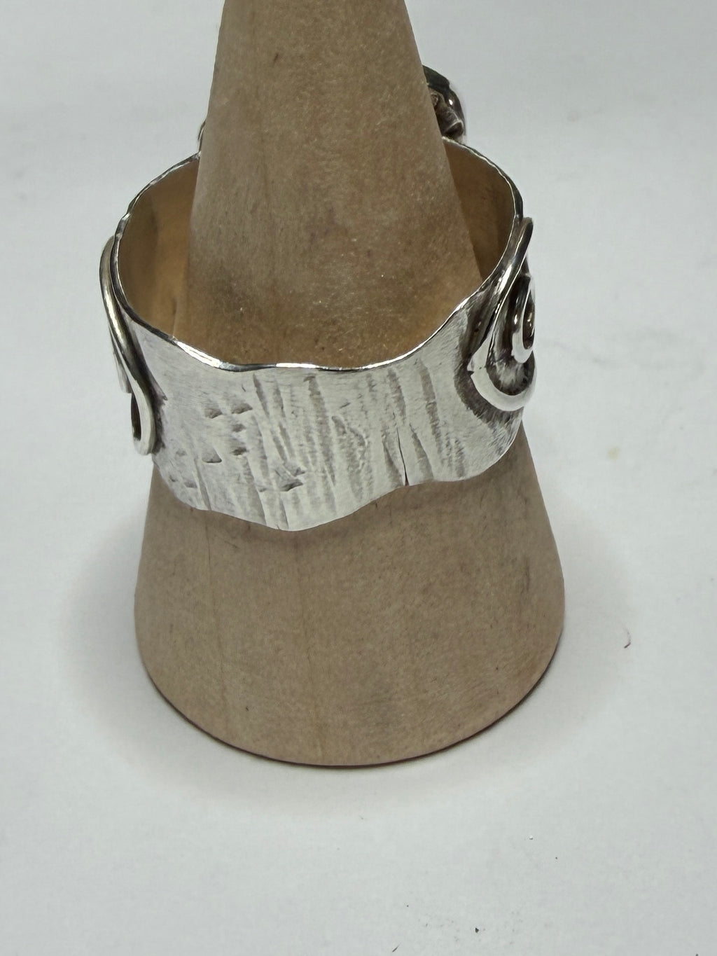 Handmade sterling silver swirl ring with blue sea glass. Size R