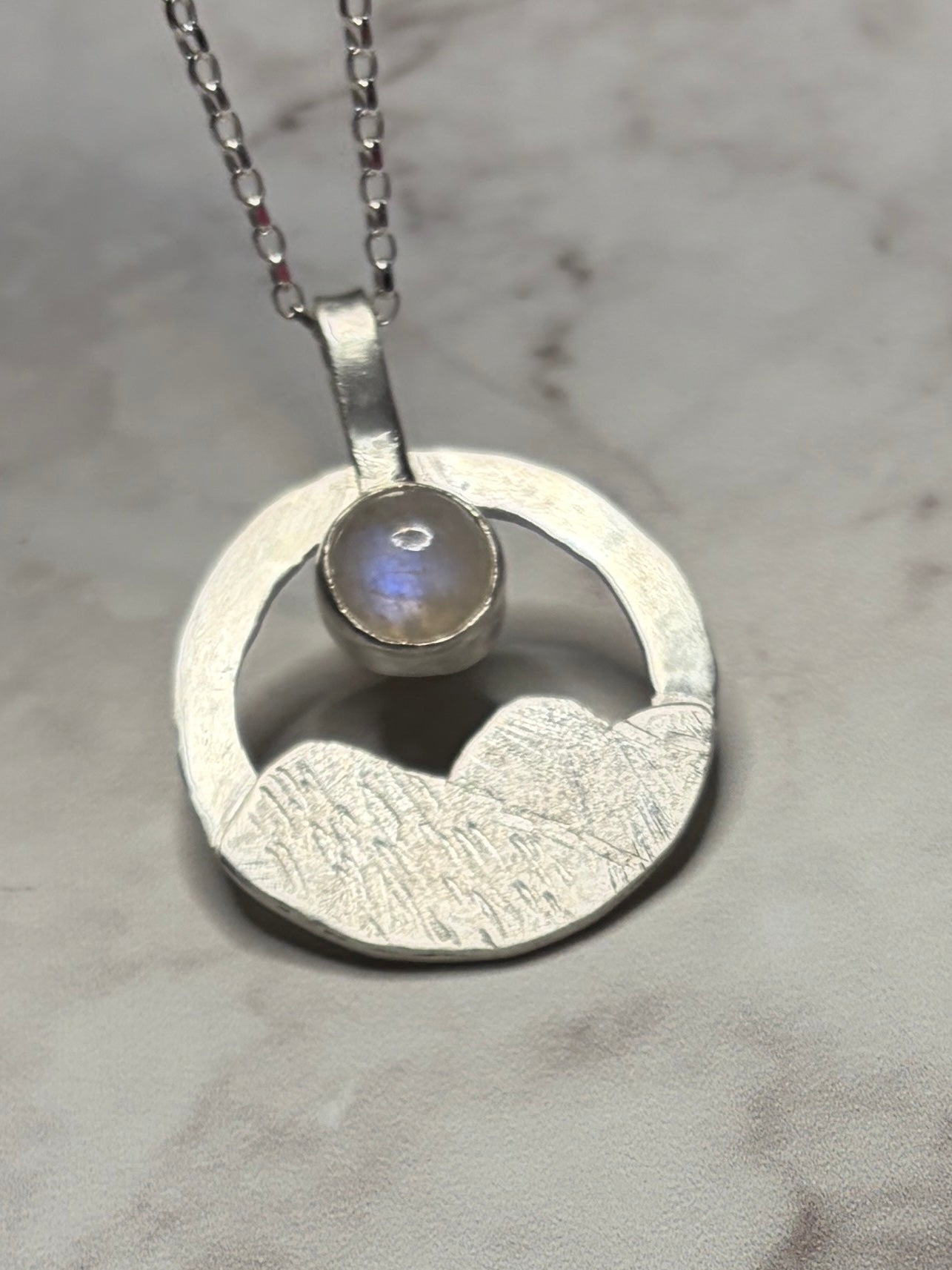 Sterling silver pendant with moonstone on an 18inch chain.