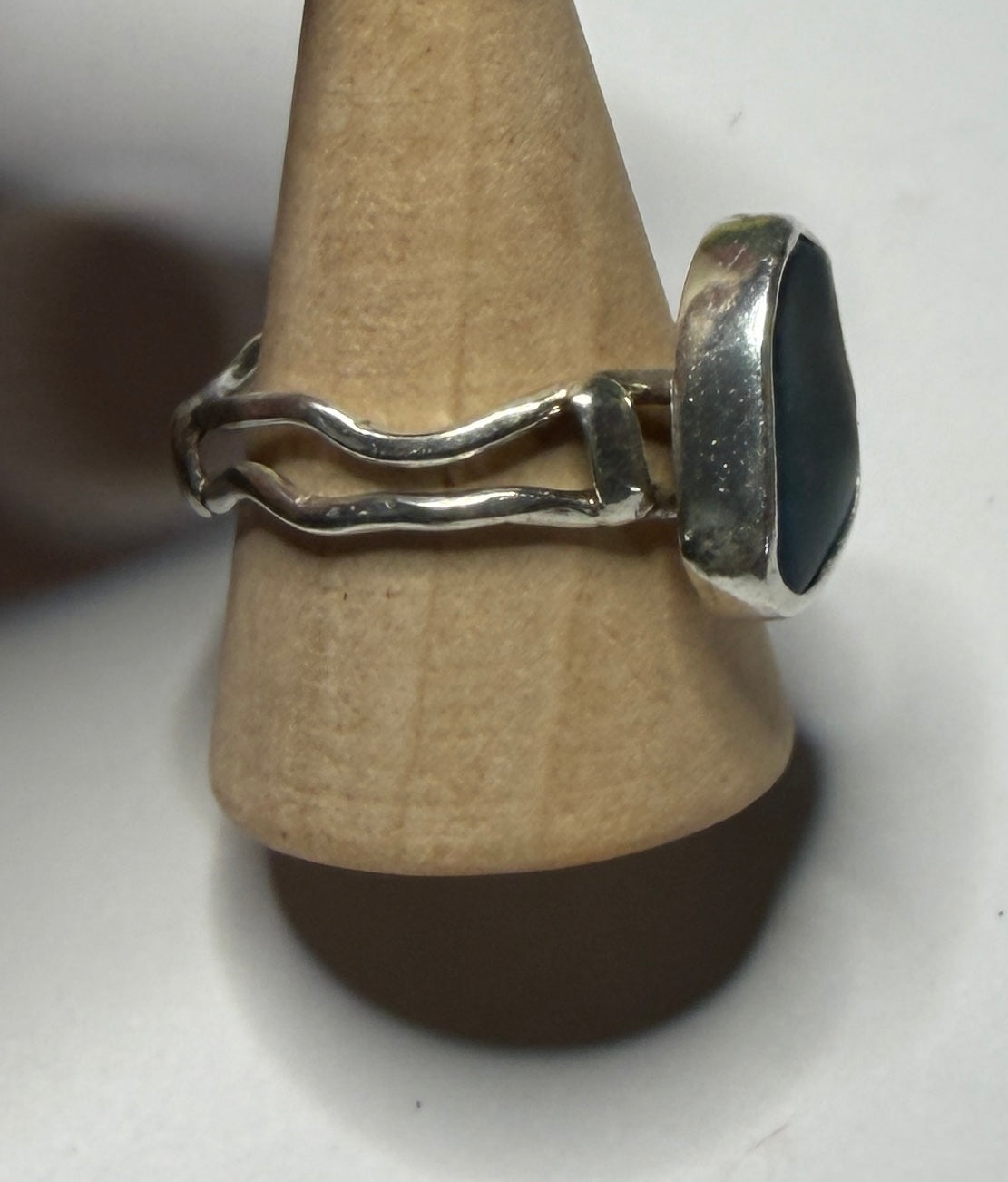Handmade sterling silver wave ring with blue sea glass