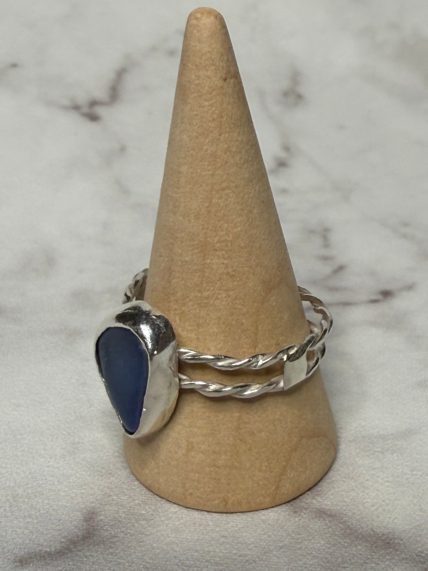 Handmade sterling silver double twist band with blue sea glass. Size S