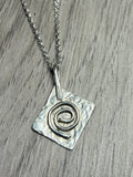 Handmade sterling silver Celtic swirl pendant on 20inch chain.
