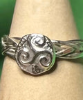 Hand made silver Celtic twist with triskele ring.