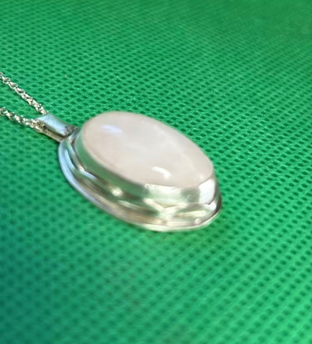 Handmade sterling silver and rose quartz stone pendant on an 18 inch necklace