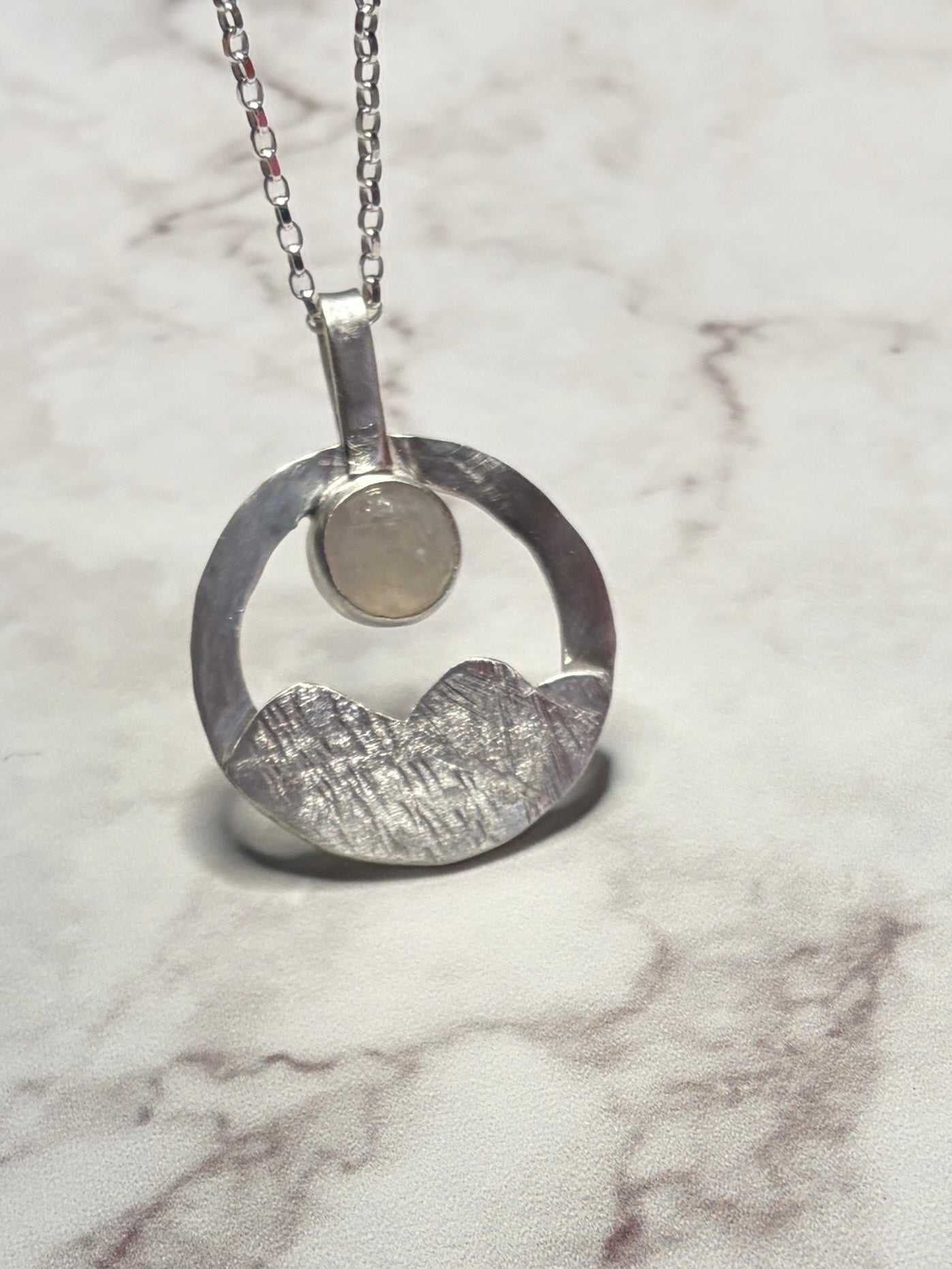 Sterling silver pendant with moonstone on an 18inch chain.