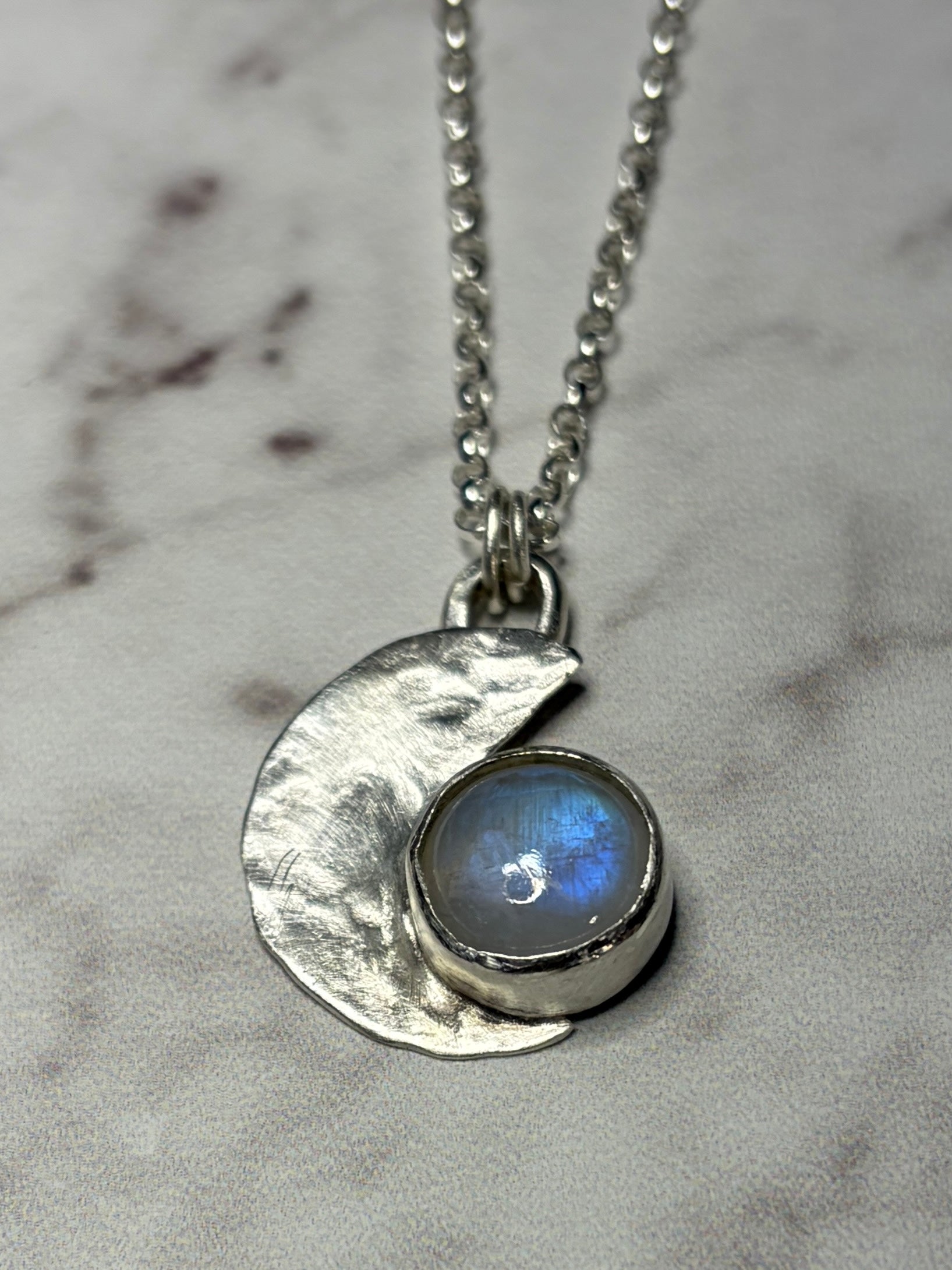 Handmade sterling silver moonstone pendant. 18 or 20 inch chain.