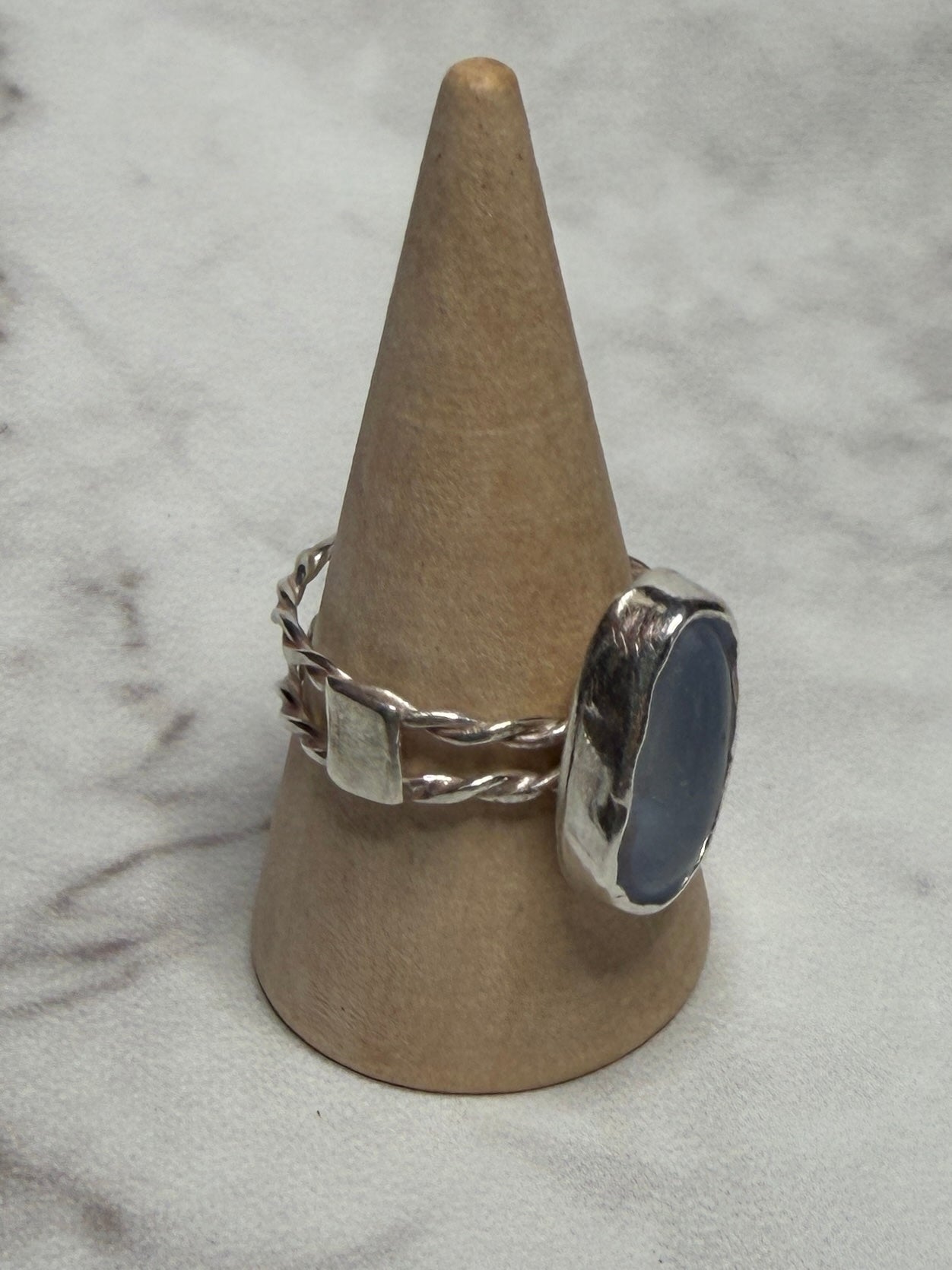 Handmade sterling silver double twist band with blue sea glass. Size Q