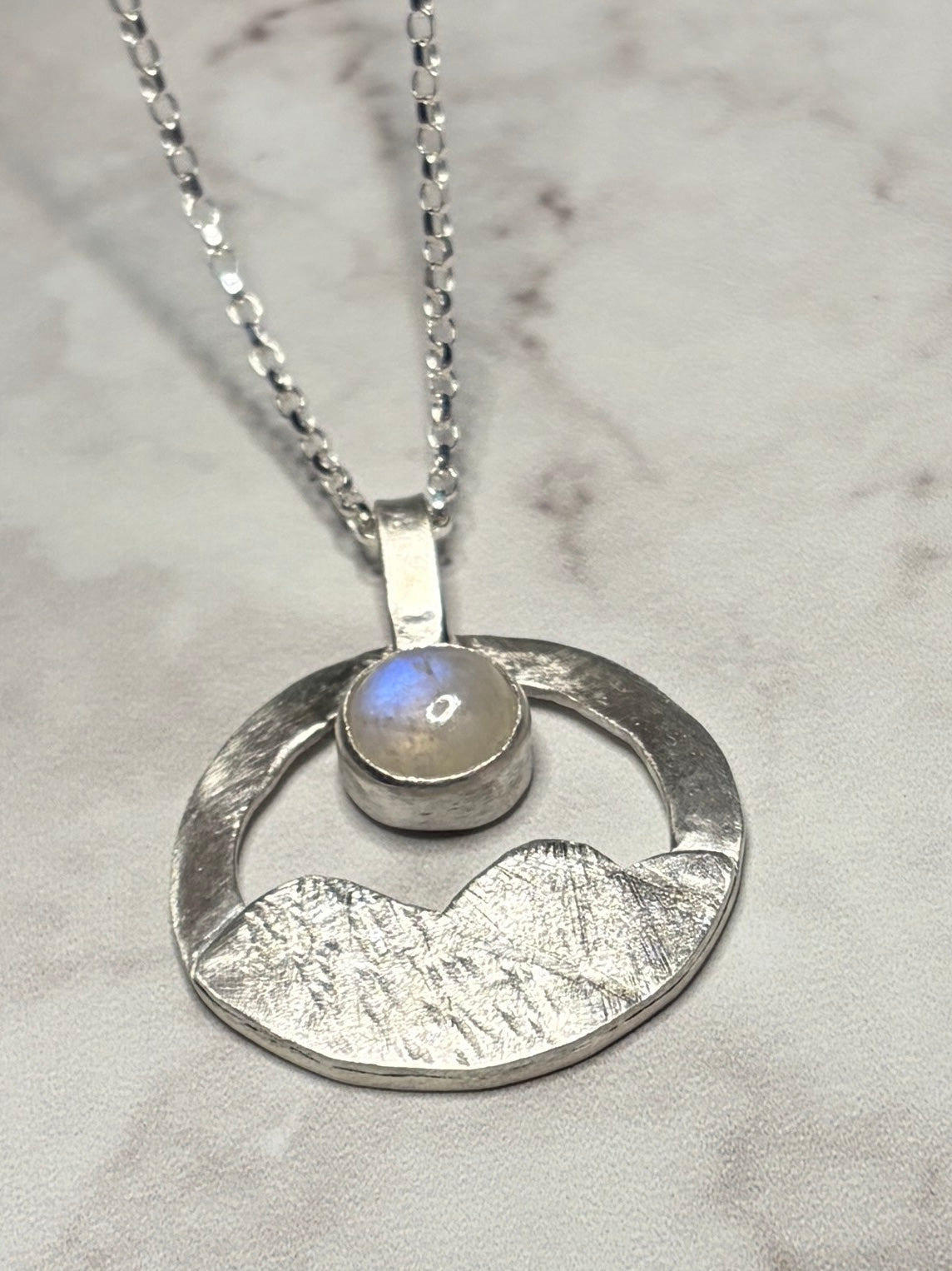 Sterling silver pendant with moonstone on an 18inch chain.
