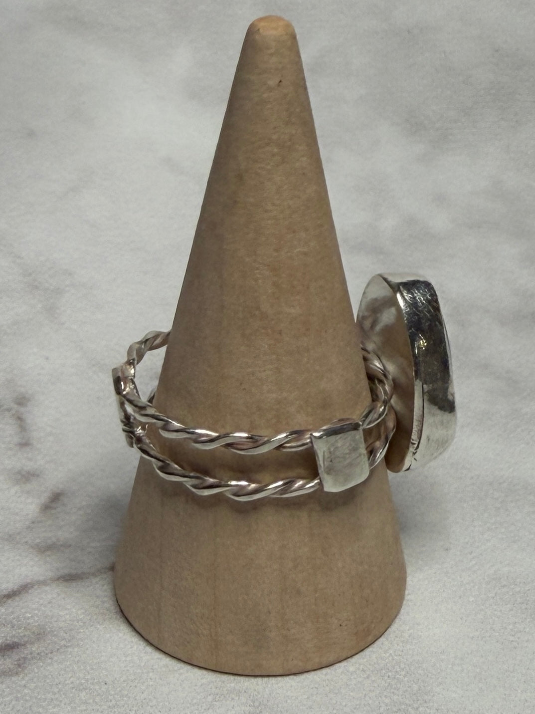 Handmade sterling silver double twist band with blue sea glass. Size Q