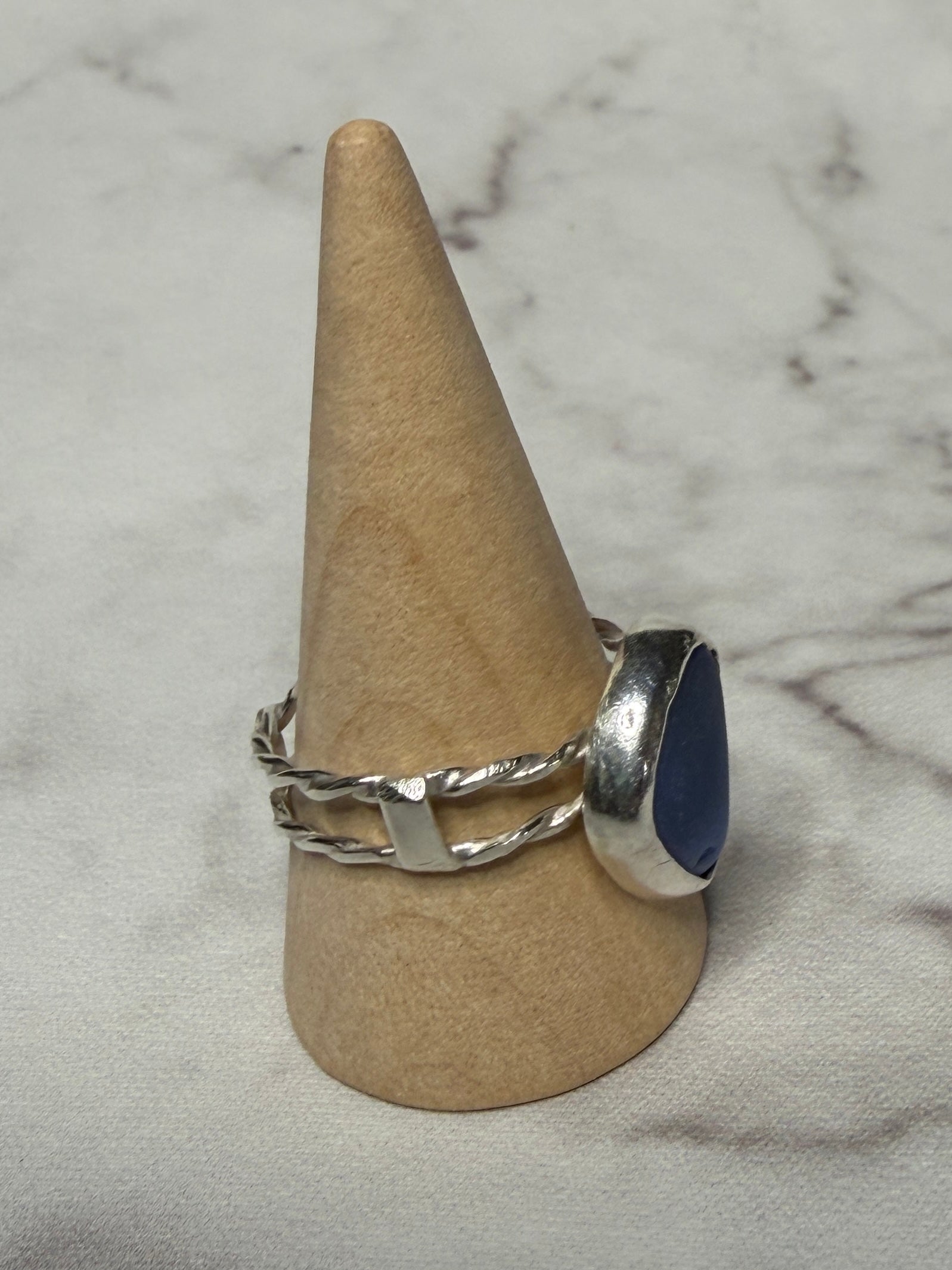 Handmade sterling silver double twist band with blue sea glass. Size S
