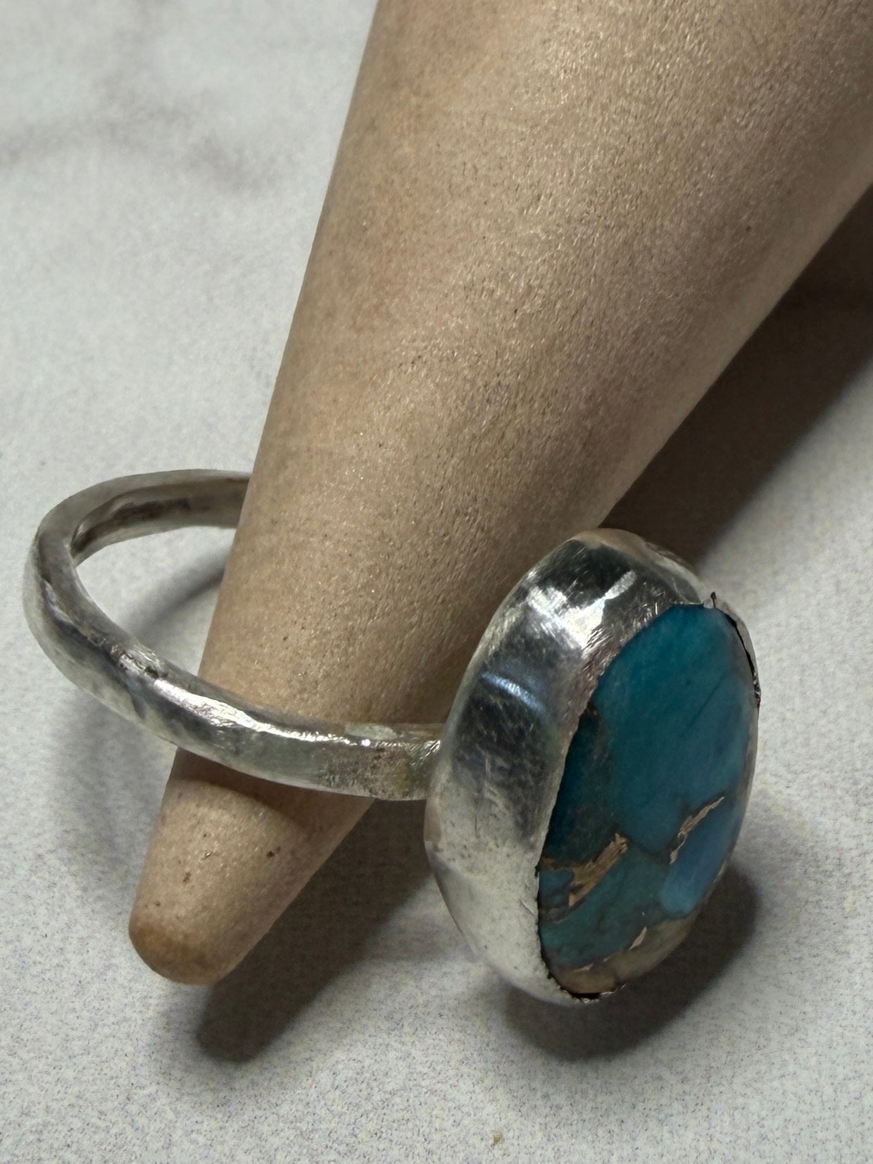 Handmade sterling silver ring with turquoise stone. Size O