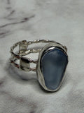 Handmade sterling silver double twist band with blue sea glass. Size Q