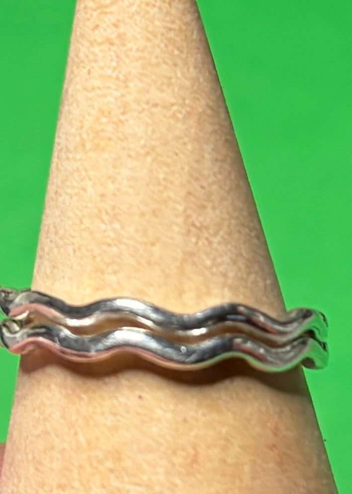 Handmade sterling silver wave ring. Two rings together.