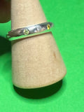 Handmade sterling silver ring with 3 CZ stones. Size N