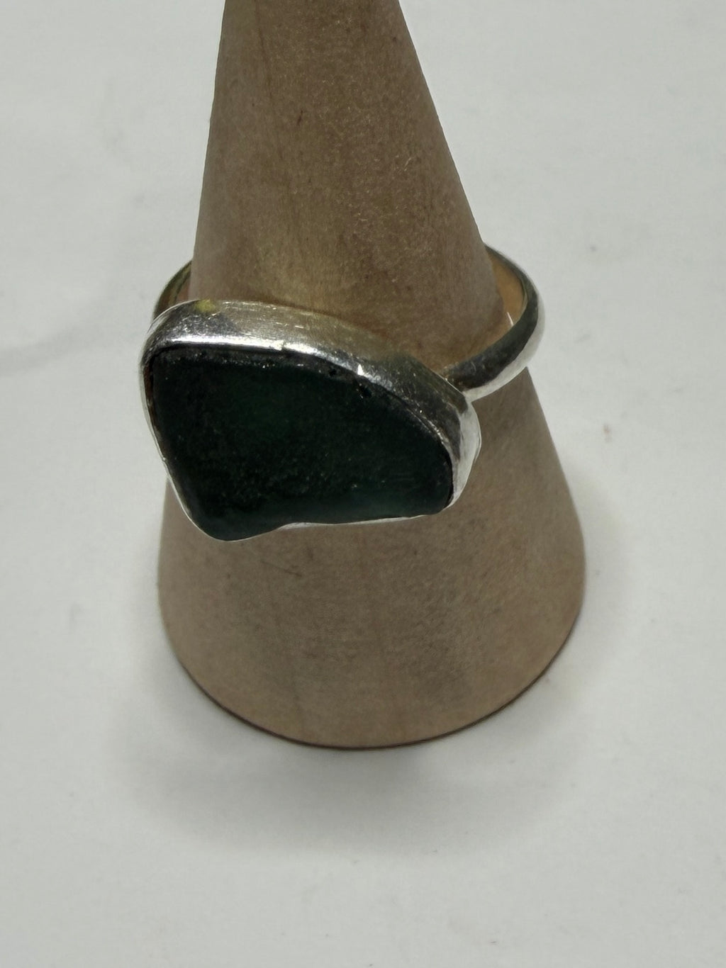 Handmade sterling silver ring with dark green sea glass. Size m