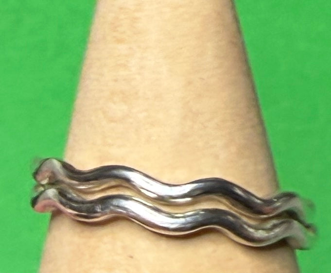 Handmade sterling silver wave ring. Two rings together.