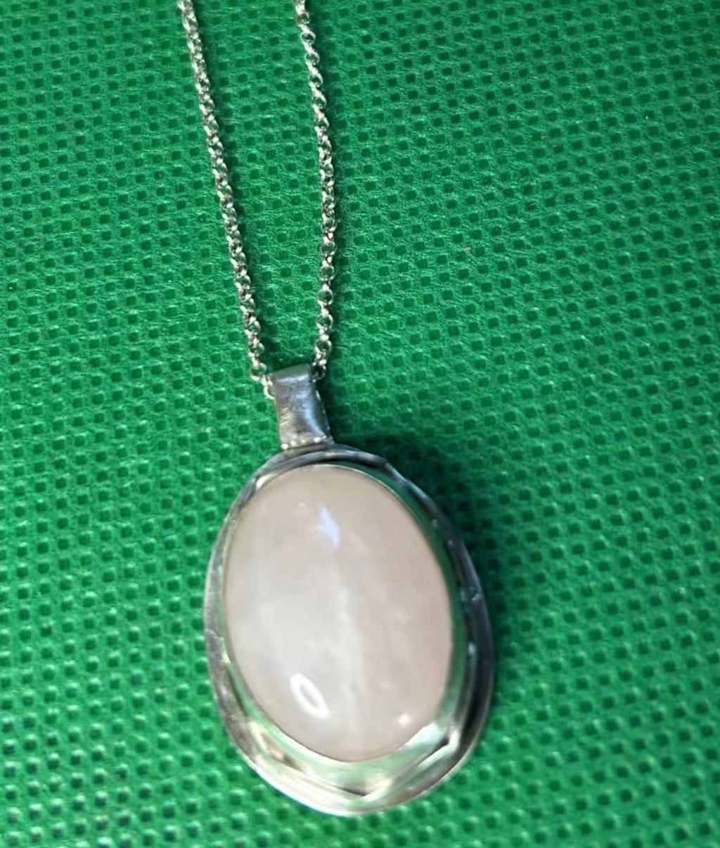 Handmade sterling silver and rose quartz stone pendant on an 18 inch necklace