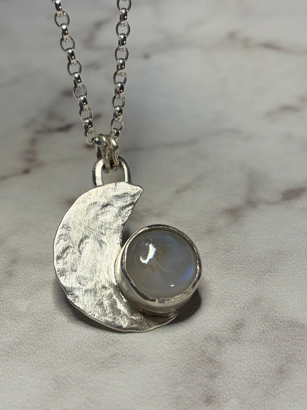 Handmade sterling silver moonstone pendant. 18 or 20 inch chain.