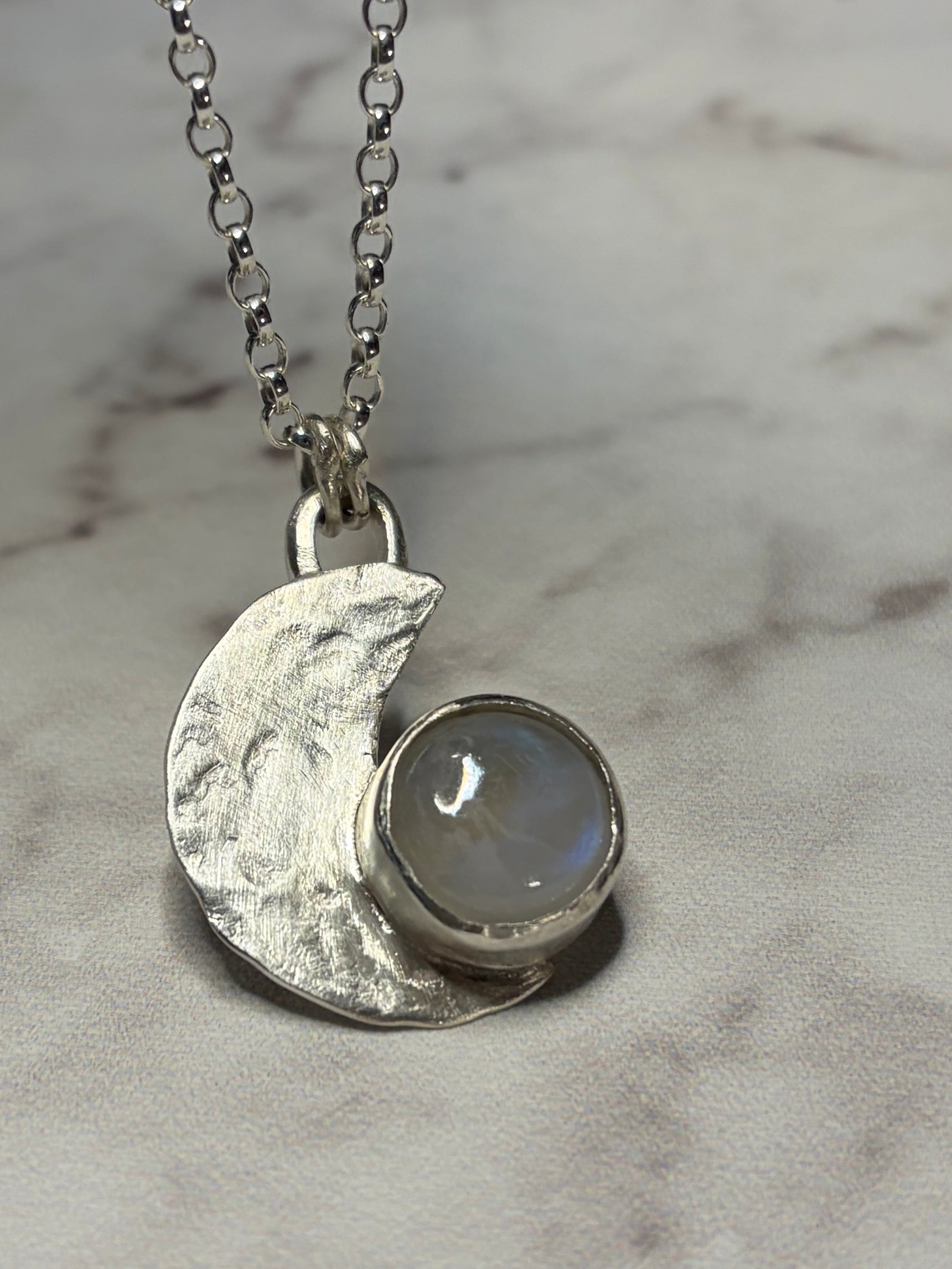 Handmade sterling silver moonstone pendant. 18 or 20 inch chain.