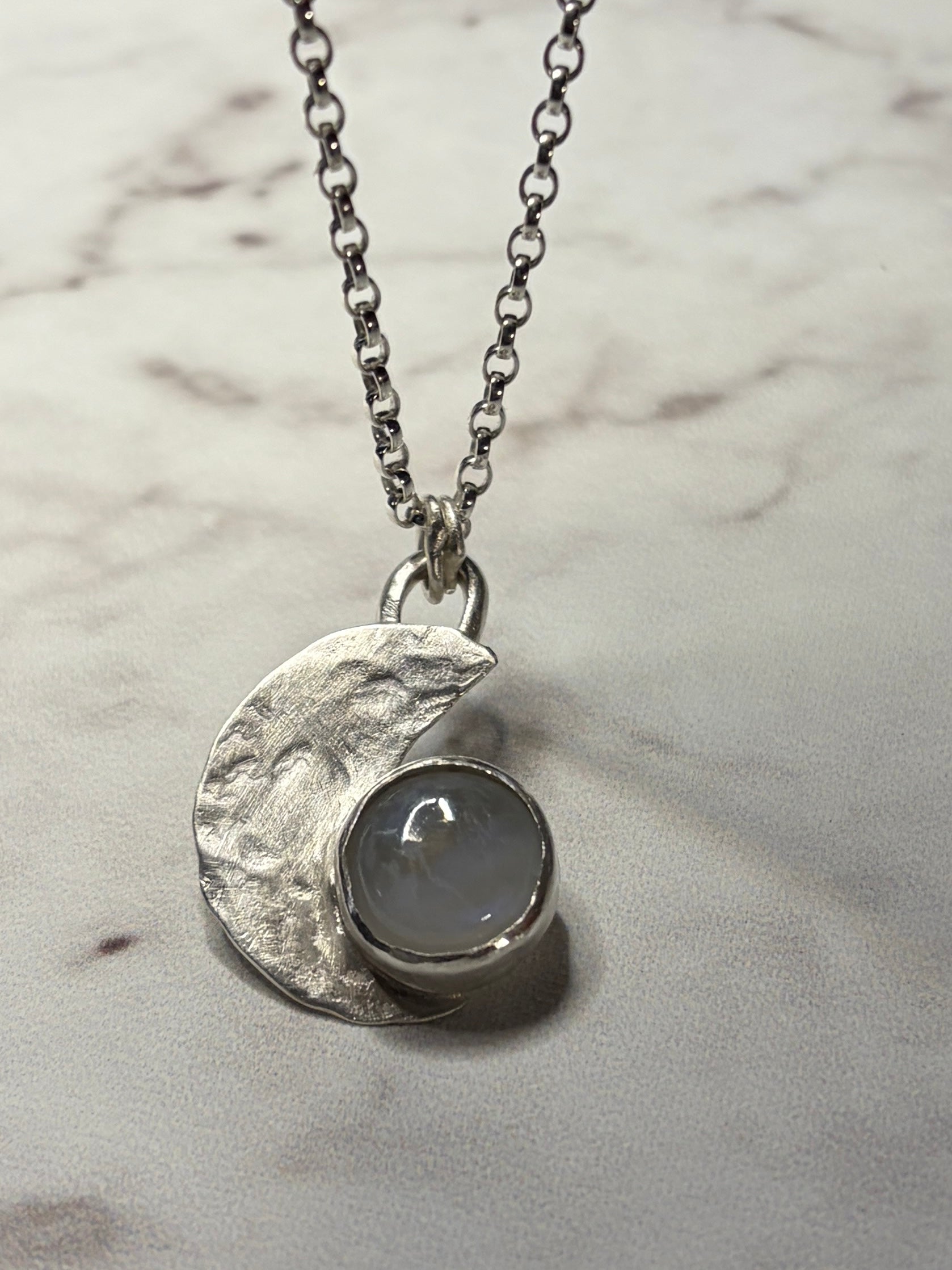 Handmade sterling silver moonstone pendant. 18 or 20 inch chain.