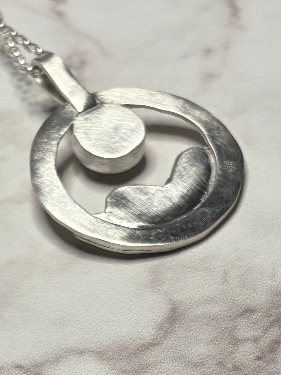 Sterling silver pendant with moonstone on an 18inch chain.