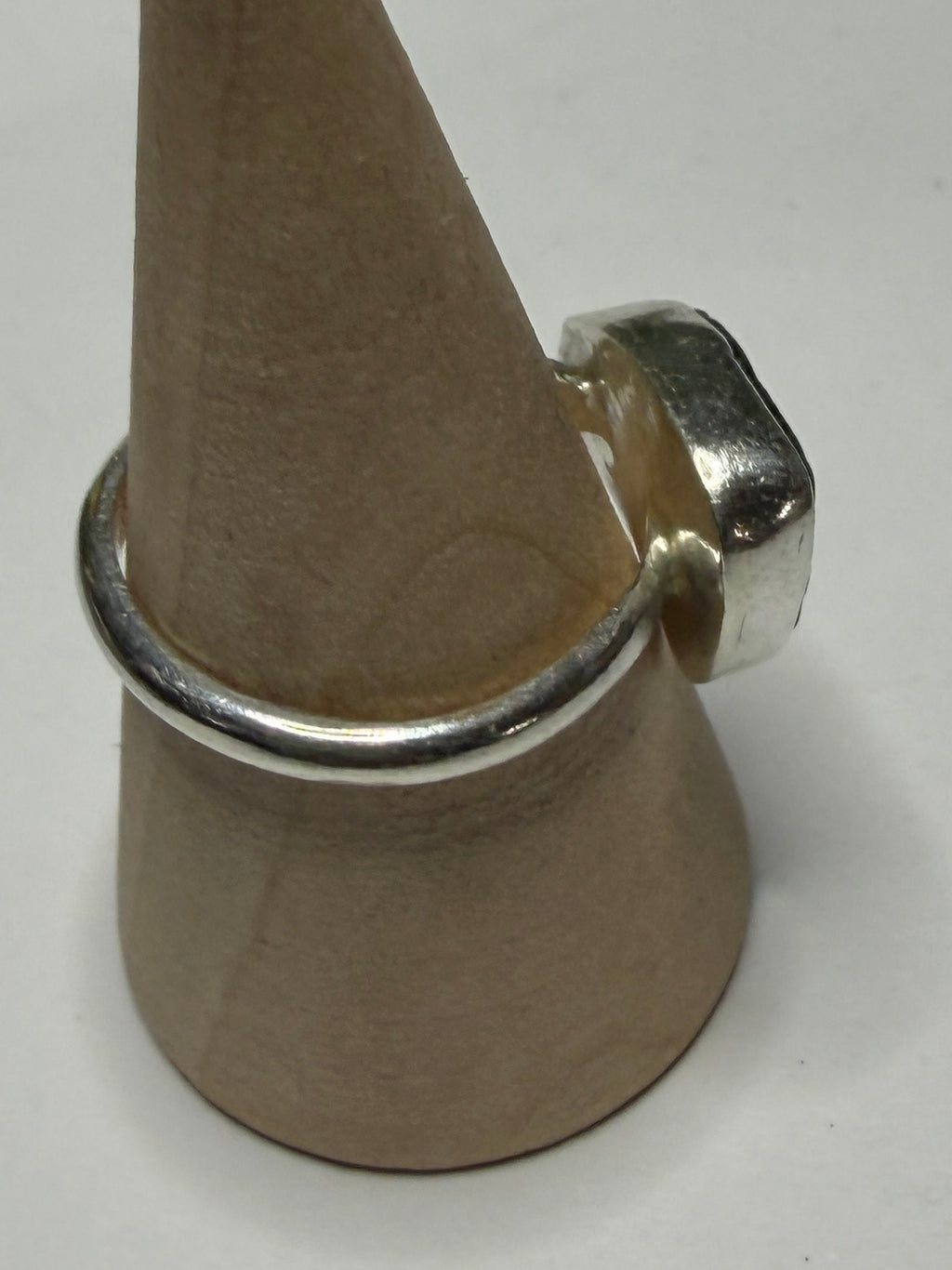 Handmade sterling silver ring with dark green sea glass. Size m