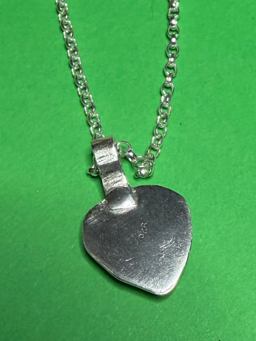 Handmade sterling silver Celtic heart with background on 18 or 20 inch chain.