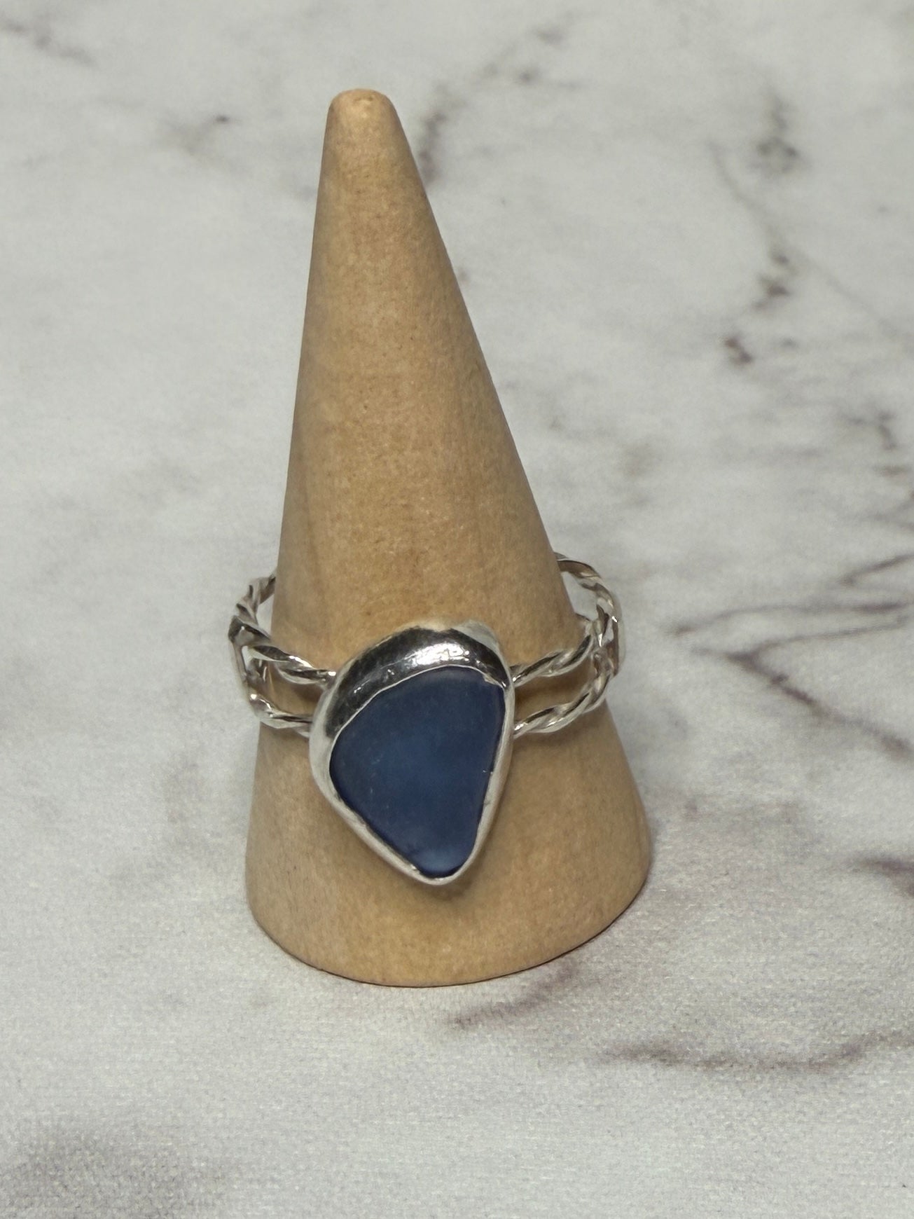 Handmade sterling silver double twist band with blue sea glass. Size S