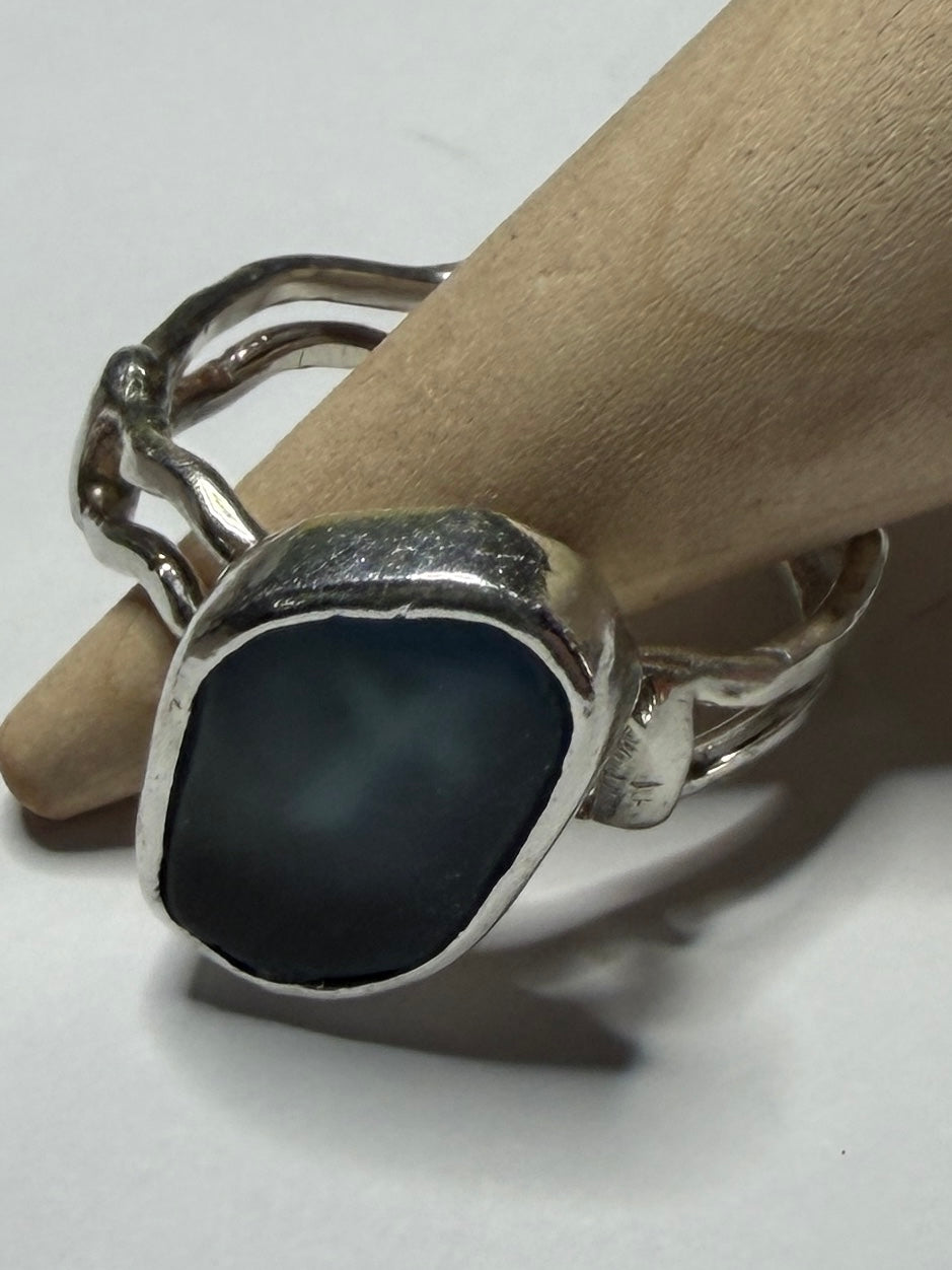 Handmade sterling silver wave ring with blue sea glass
