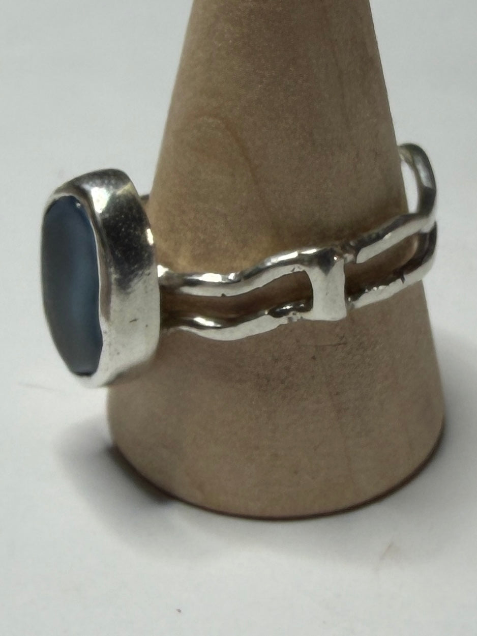 Handmade sterling silver wave ring with blue sea glass