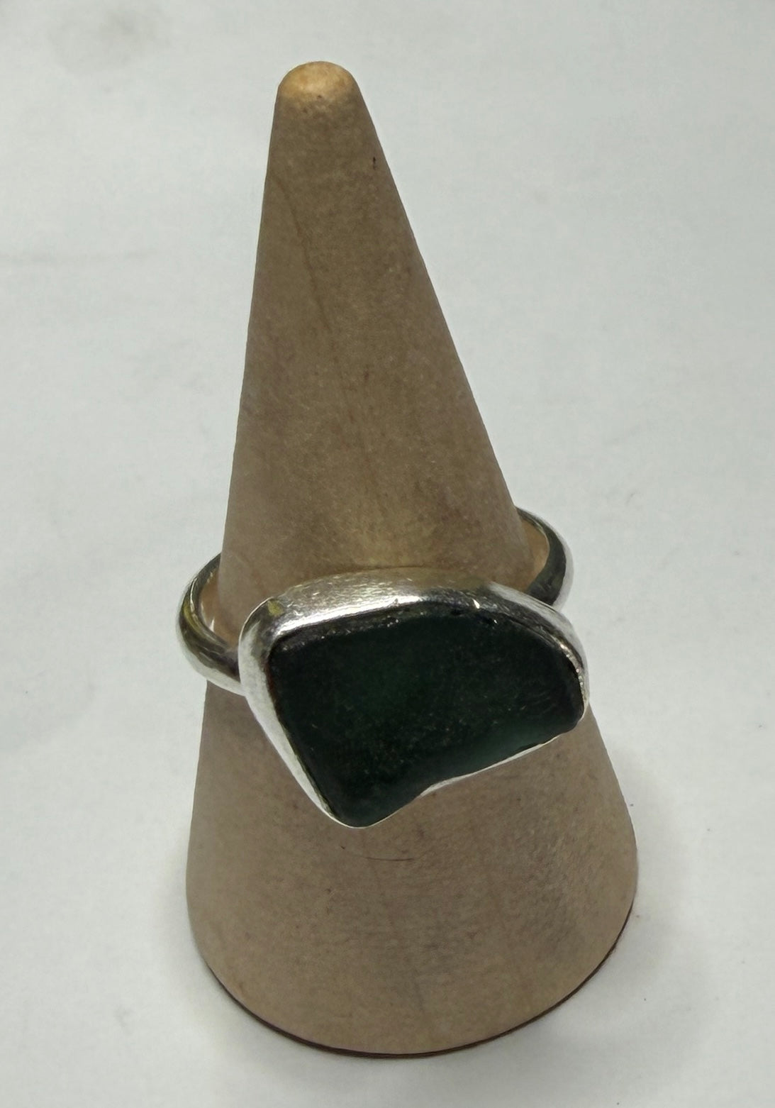 Handmade sterling silver ring with dark green sea glass. Size m