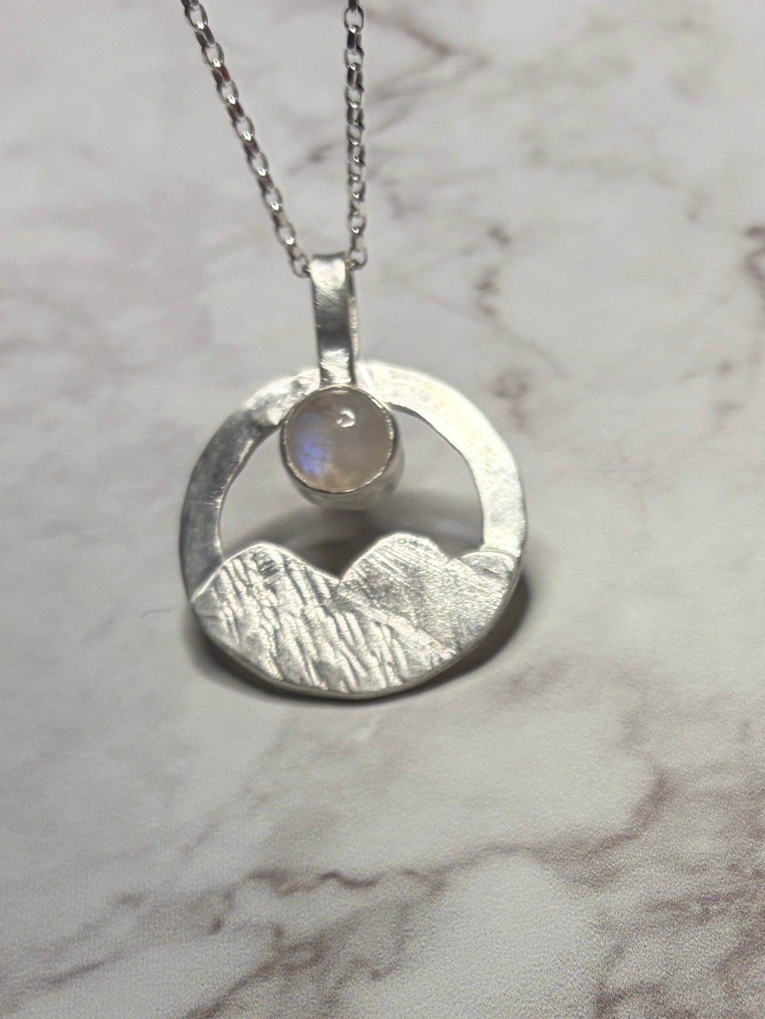 Sterling silver pendant with moonstone on an 18inch chain.