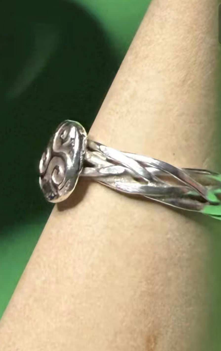 Hand made silver Celtic twist with triskele ring. Size L