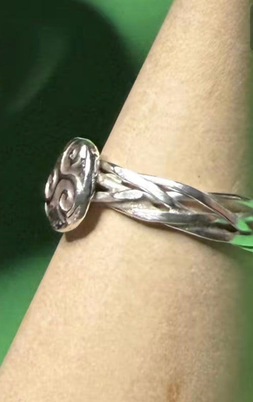 Hand made silver Celtic twist with triskele ring. Size L