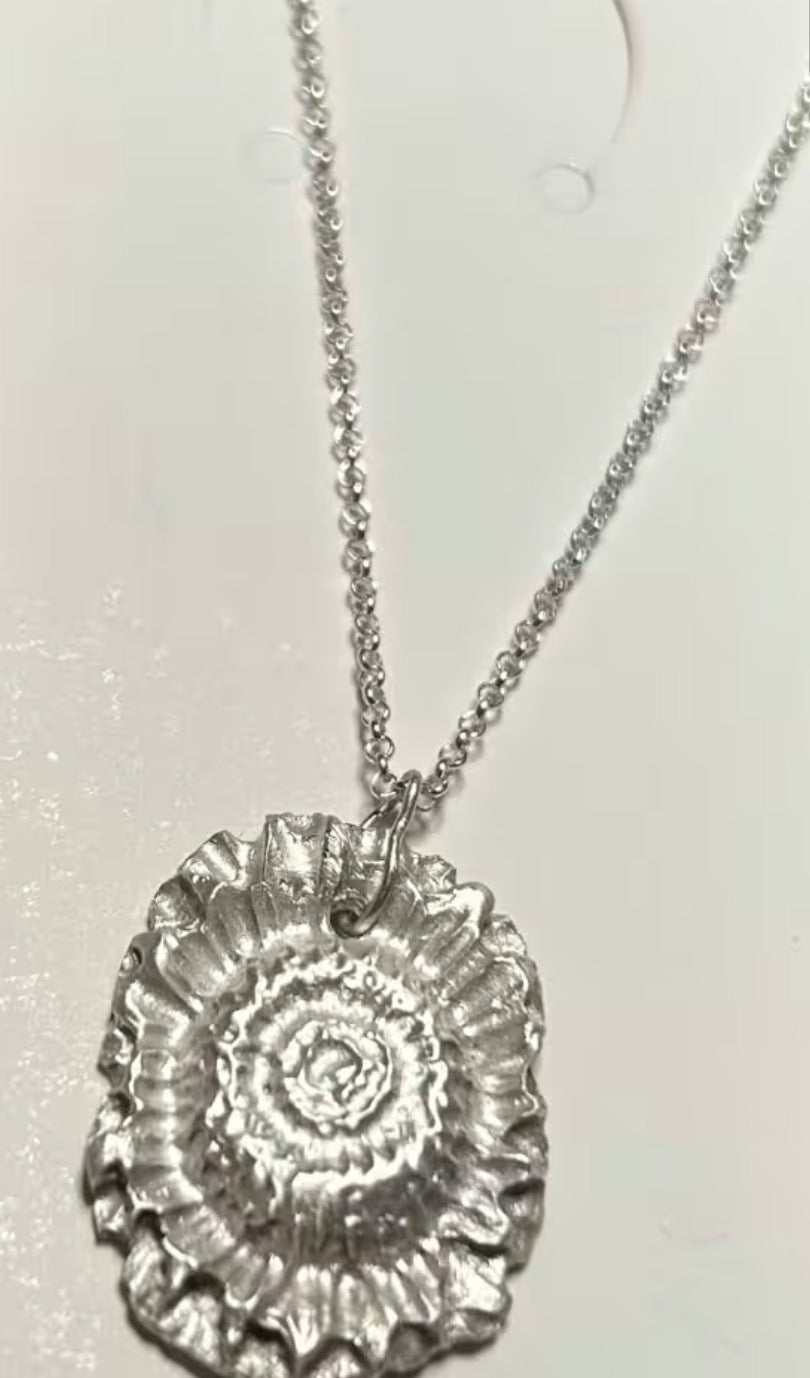Handmade solid fine silver flower pendant on an 18 inch necklace