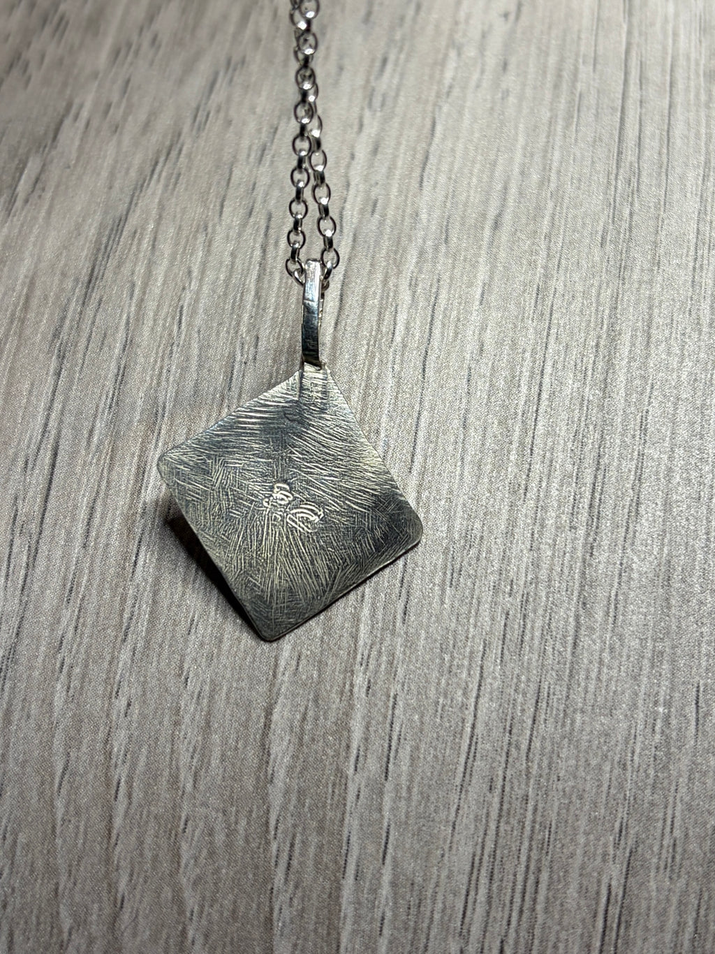 Handmade sterling silver Celtic swirl pendant on 20inch chain.
