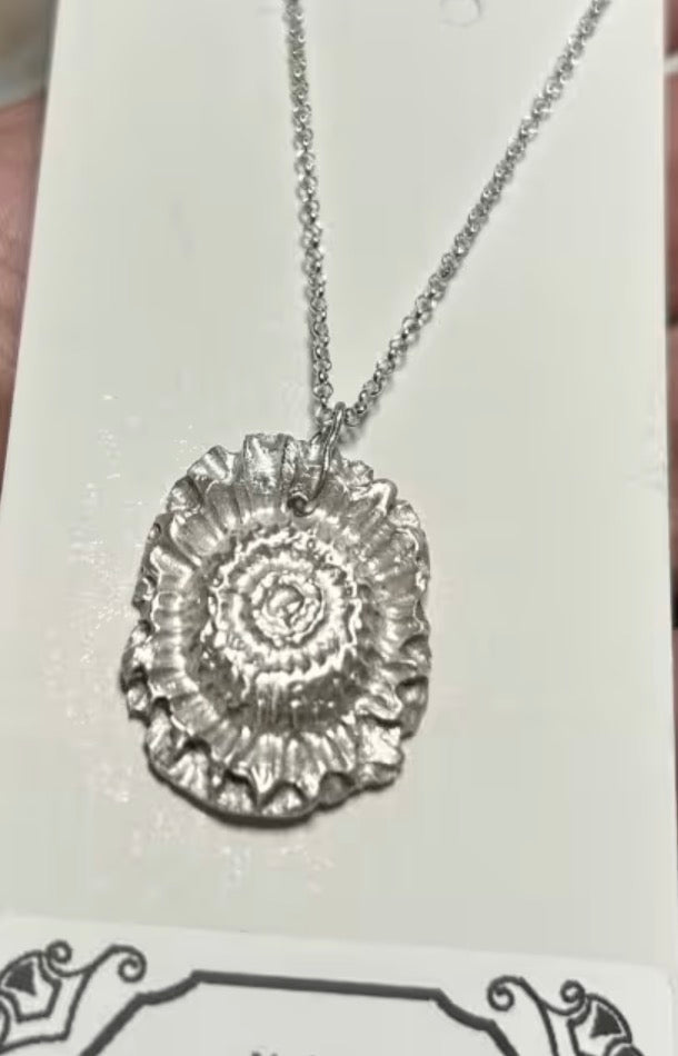 Handmade solid fine silver flower pendant on an 18 inch necklace