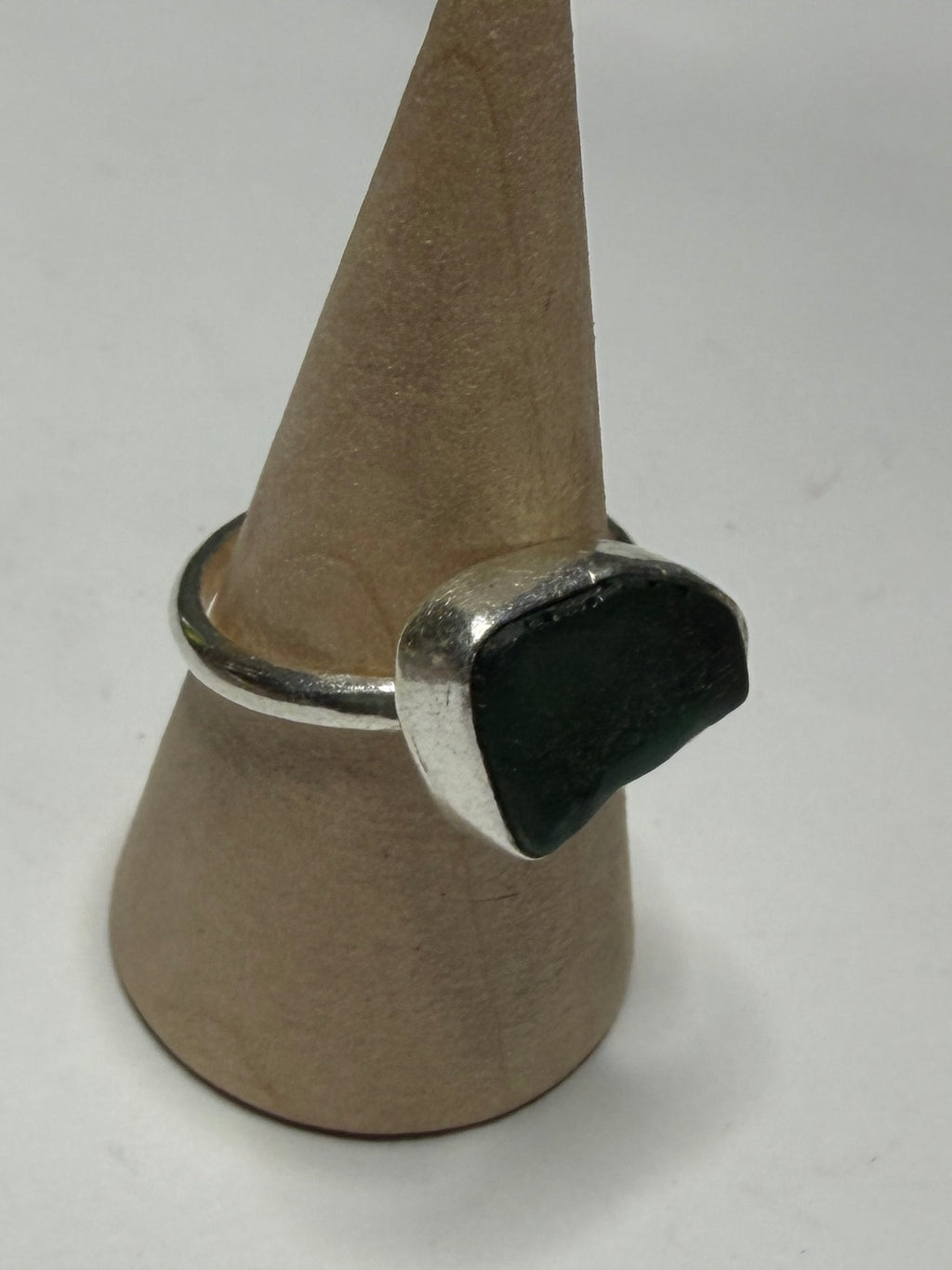 Handmade sterling silver ring with dark green sea glass. Size m