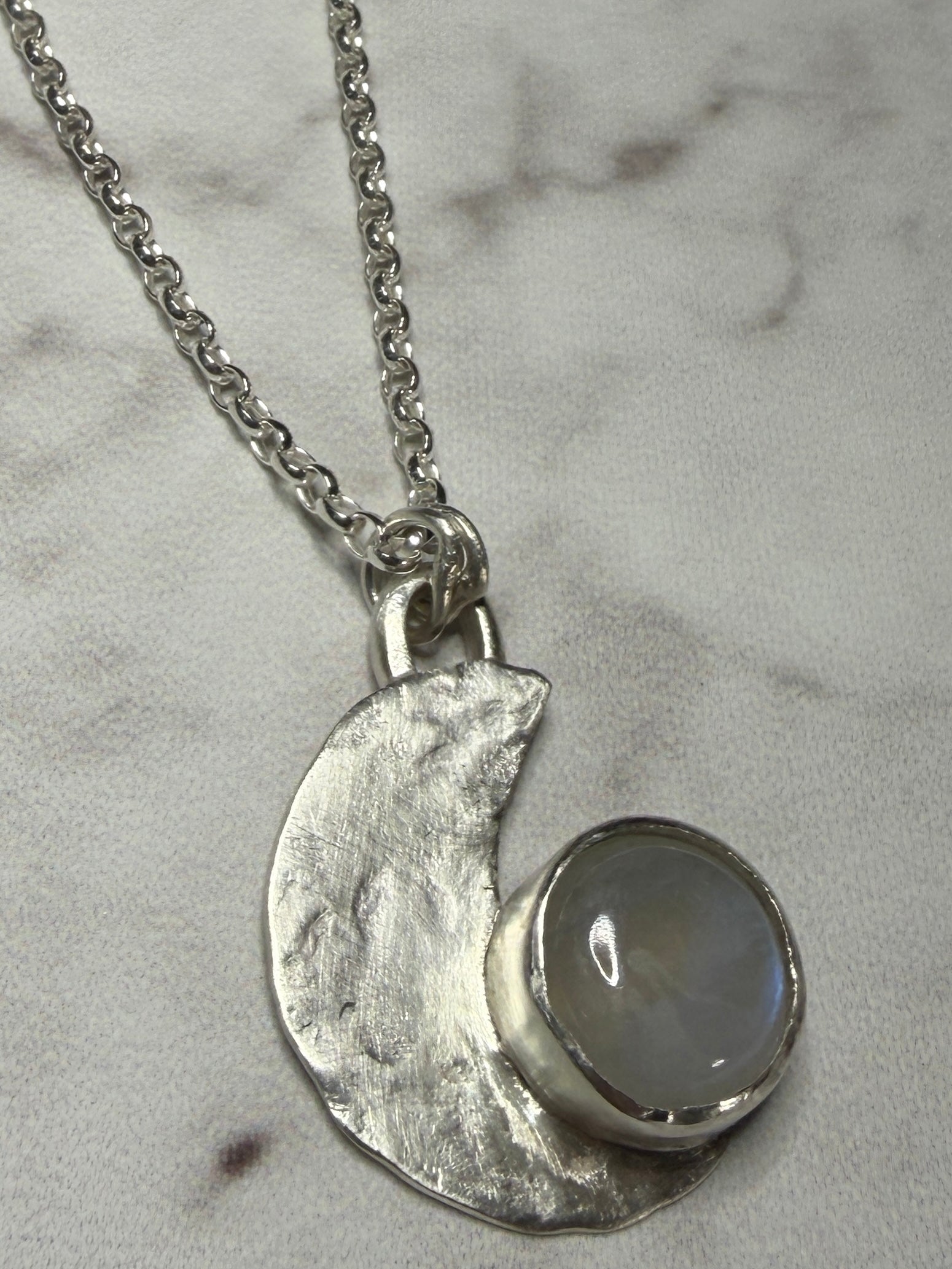 Handmade sterling silver moonstone pendant. 18 or 20 inch chain.
