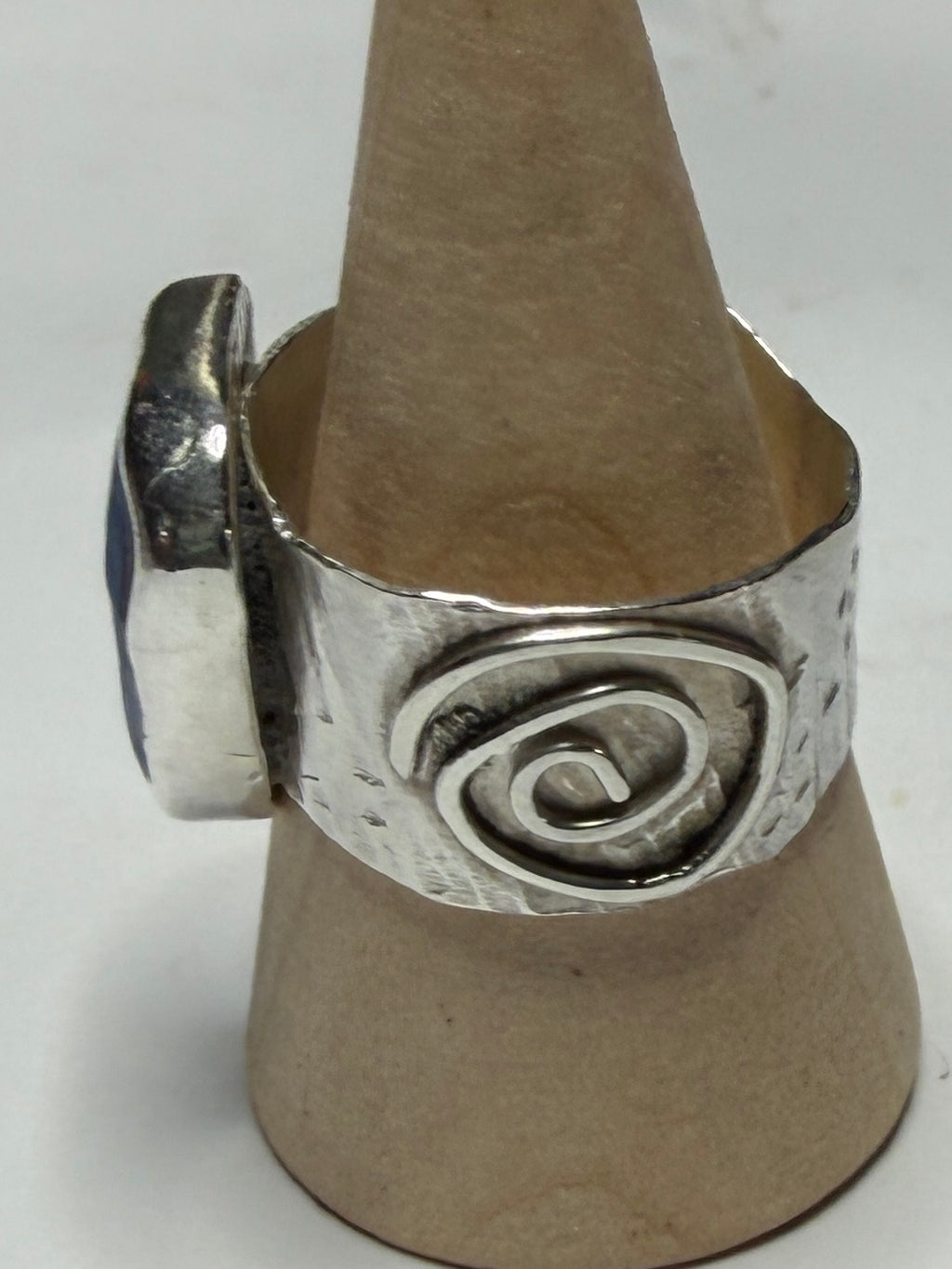 Handmade sterling silver swirl ring with blue sea glass. Size R