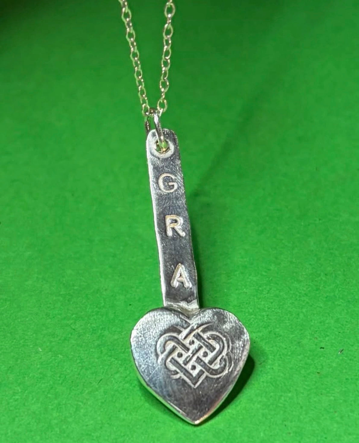 Handmade sterling silver love heart gra pendant on 18inch necklace.
