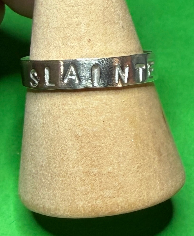 Hand made sterling silver slainte ring. Means health.