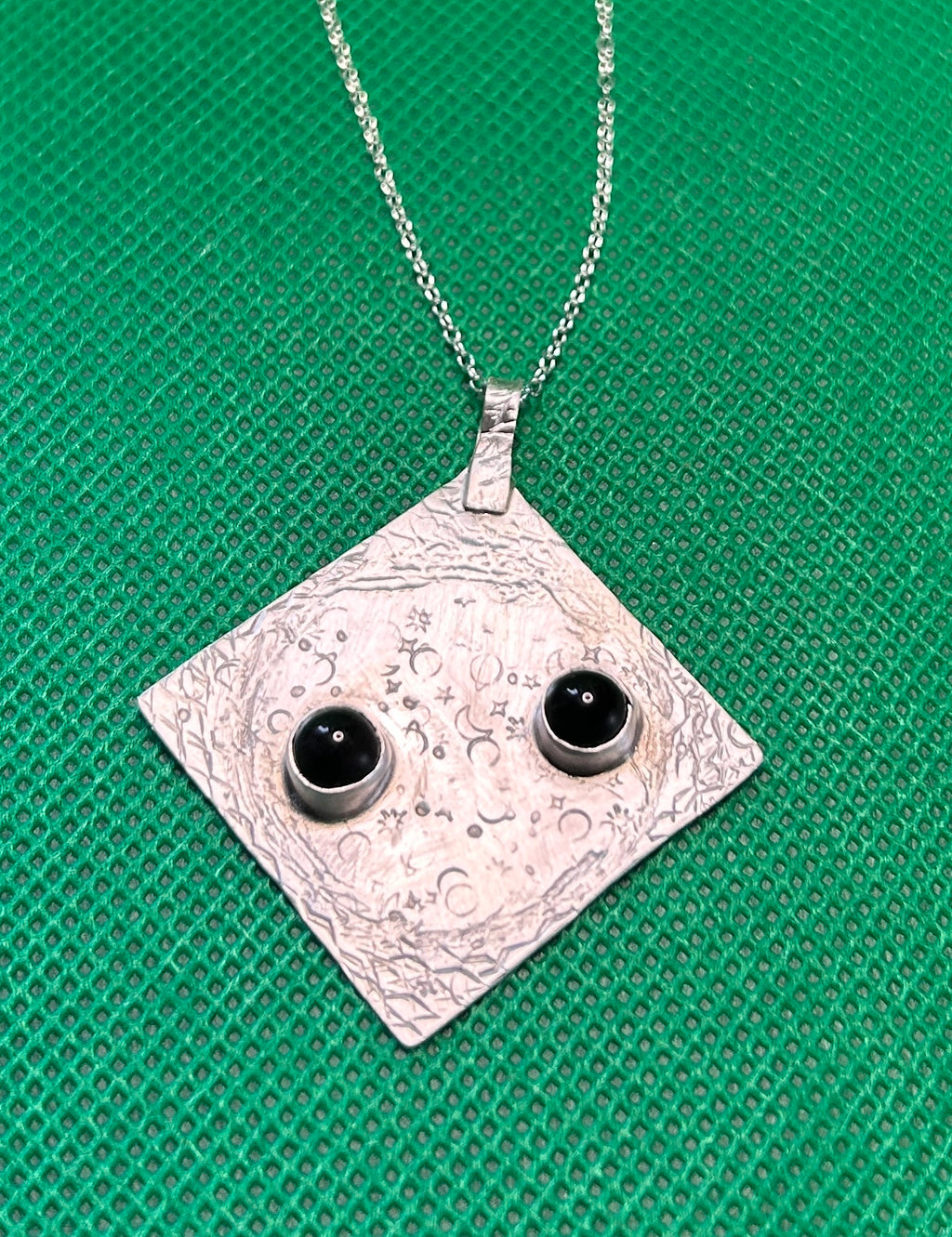 Handmade silver pendant with black onyx stone on an 18 inch necklace